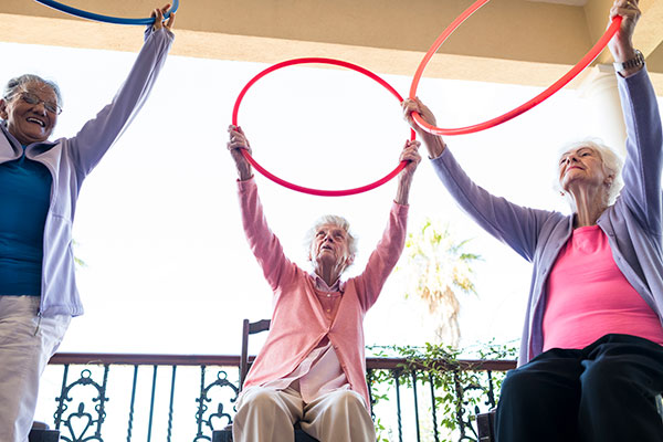 Photo of a senior woman at a fitness class at retirement home